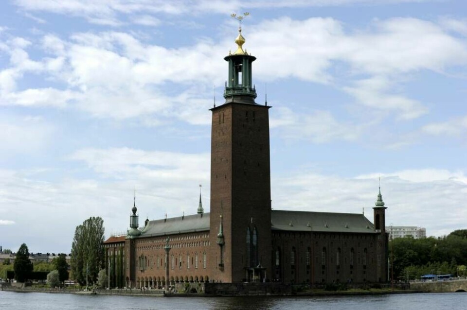 Stockholm stadshus står som symbol för ett Sverige under Tre kronor (treenigheten). Foto: Janerik Henriksson / TT