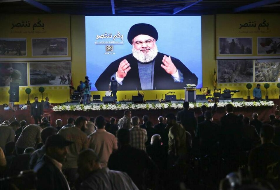 Hizbollah ledare Sayyed Hassan Nasrallah håller tal för sina anhängare i augusti 2018. Ledaren för den militanta organisationen sa att sanktionerna mot Iran eller hans grupp inte kommer att ha någon större inverkan på dem. Men trots Sayyeds ord är ekonomin i Iran i dåligt skick, och lirans värde har reducerats med en tredjedel. Foto: Hussein Malla / AP / TT