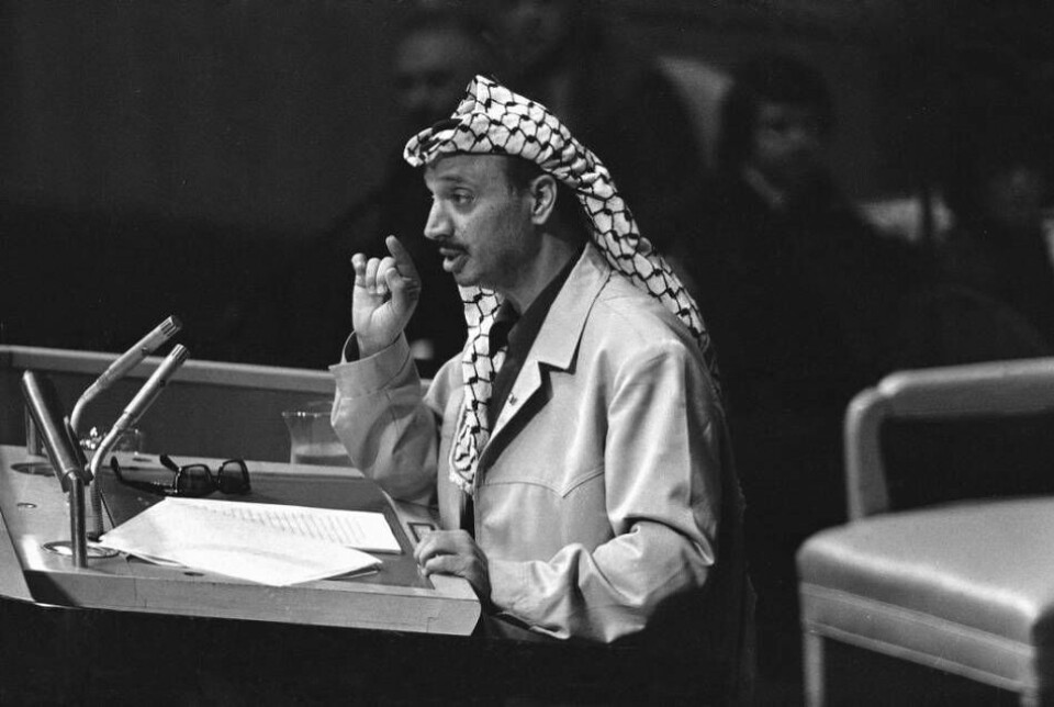 PLO:s dåvarande ledare, Yassir Arafat, håller tal i FN:s generalförsamling, 1974. Foto: AP/TT