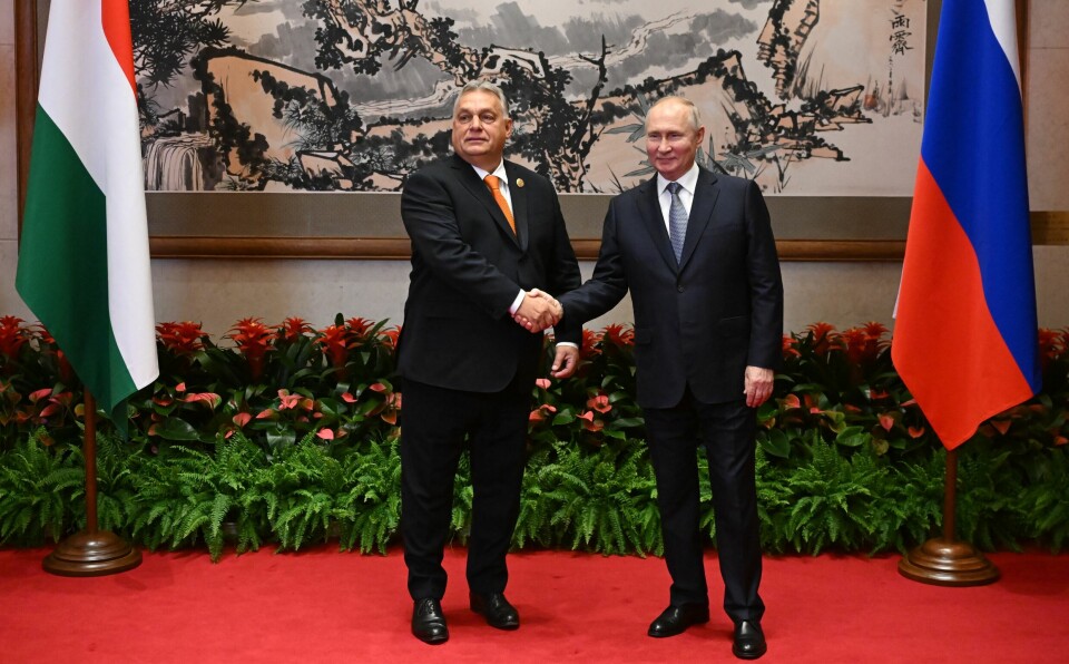 Russian President Vladimir Putin, right, and Hungarian Prime Minister Viktor Orban shake hands prior to their talks on the sidelines of the Belt and Road Forum in Beijing, China, on Tuesday, Oct. 17, 2023. (Grigory Sysoyev, Sputnik, Kremlin Pool Photo via AP) XAZ109