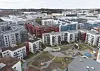 En flygbild över Barkarbystadens lägenhetshus