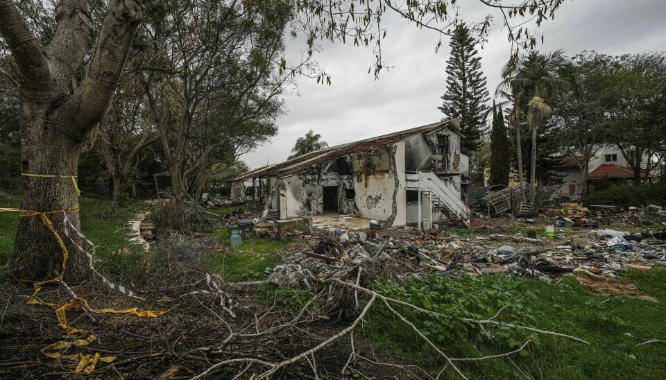 A battle-scarred home in Kibbutz Be'eri, an Israeli communal farm on the Gaza border, is seen Thursday, Jan. 11, 2024. Hamas held more than a dozen hostages in the home when it overran southern Israel on Oct. 7. At the end of an hours-long battle between the militants and Israeli forces, only two hostages survived, and relatives of the slain hostages now demand to know if their loved ones were killed by friendly fire from an Israeli tank (AP Photo/Tsafrir Abayov) XOB117