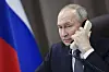 FILE - Russian President Vladimir Putin speaks on the phone with a girl from the Moscow region, as part of a Christmas charity campaign in St. Petersburg, Russia, Dec. 26, 2024. (Alexander Kazakov, Sputnik, Kremlin Pool Photo via AP, File) NYRL512