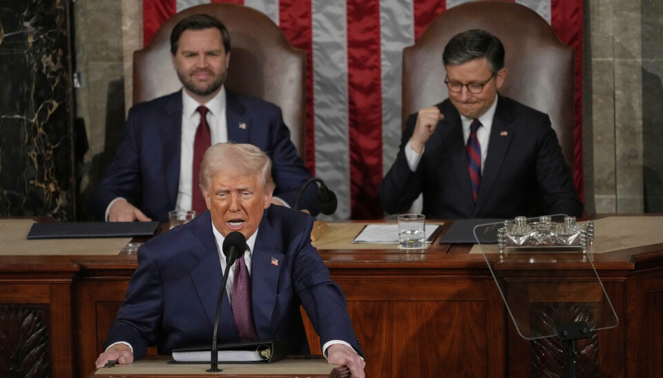 USA:s nya guldålder har precis börjat, sade Trump i sitt tal. Bakom honom syns vicepresident JD Vance och talman Mike Johnson.
