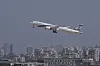 An airplane from am Israeli company, takes off following the announcement of a ceasefire between Israel and Iran, at Ben Gurion International Airport, near Tel Aviv, Israel, Wednesday, June 25, 2025. (AP Photo/Ohad Zwigenberg) XLC115