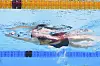Wan Letian of China competes in the women's 100-meter backstroke semifinal at the World Aquatics Championships in Singapore, Monday, July 28, 2025. (AP Photo/Lee Jin-man) LJM162