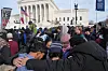 A group from St. Peter and Paul parish in New York pray at the Supreme Court as they participate in the annual March for Life Friday, Jan. 23, 2026, in Washington. (AP Photo/Jacquelyn Martin) DCJE308