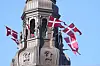 Danish flags are attached to the spire of Christiansborg Castle, the Danish Parliament building in Copenhagen, Denmark, Sunday Sept. 5, 2021, on the official Flag Day honoring Denmark's deployed soldiers through the ages. (Keld Navntoft/Ritzau Scanpix via AP) COP801