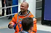Mission pilot Victor Glover gives a thumbs up to his family as he leaves the Operations and Checkout Building for a trip to Launch Pad 39-B and a planned liftoff on NASA's Artemis II moon rocket at the Kennedy Space Center Wednesday, April 1, 2026, in Cape Canaveral, Fla. (AP Photo/Chris O'Meara) KSC208
