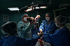 A doctor holds a newborn girl, Diana, after performing a cesarean section on her mother, Olha Karpenko, at the regional perinatal center of Zaporizhzhia, Ukraine, Wednesday, May 6, 2026. (AP Photo/Evgeniy Maloletka) MAL615