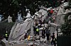 Rescuers search for victims in a collapsed building following an earthquake in Caracas on June 24, 2026. A magnitude 7.1 earthquake struck Venezuela on Wednesday, the United States Geological Survey (USGS) reported, triggering panic in Caracas, according to AFP journalists. The tremor, which was followed by several aftershocks, was also felt in Colombia. (Photo by Juan BARRETO / AFP)