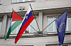 A Palestinian flag flies next to a Slovenian, center, and a European Union flag, right, at the government building in Ljubljana, Slovenia, Thursday, May 30, 2024. Slovenia’s government has endorsed a motion to recognize a Palestinian state and sent it to parliament for approval. Prime Minister Robert Golob's ruling liberal coalition has a comfortable majority in the 90-member assembly and the vote should be formality. The decision by the Slovenian government on Thursday comes just two days after Spain, Norway and Ireland recognized a Palestinian state. It was a move that was slammed by Israel. (AP Photo) XAA101