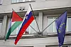 A Palestinian flag flies next to a Slovenian, center, and a European Union flag, right, at the government building in Ljubljana, Slovenia, Thursday, May 30, 2024. Slovenia’s government has endorsed a motion to recognize a Palestinian state and sent it to parliament for approval. Prime Minister Robert Golob's ruling liberal coalition has a comfortable majority in the 90-member assembly and the vote should be formality. The decision by the Slovenian government on Thursday comes just two days after Spain, Norway and Ireland recognized a Palestinian state. It was a move that was slammed by Israel. (AP Photo) XAA101