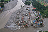 A drone view of the aftermath of flash flooding at the confluence of the Trishuli and Tadi rivers in the Devighat area of Nuwakot district, Nepal, Saturday, Aug. 29, 2026. (AP Photo/Rajesh Kumar Singh) ARX109