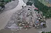 A drone view of the aftermath of flash flooding at the confluence of the Trishuli and Tadi rivers in the Devighat area of Nuwakot district, Nepal, Saturday, Aug. 29, 2026. (AP Photo/Rajesh Kumar Singh) ARX109