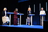 Magdalena Andersson, Nooshi Dadgostar, Elisabeth Thand Ringqvist och Daniel Helldén under en debatt på en scen.