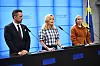 Hannes Hervieu, Elisabeth Thand Ringqvist och Emelie Rossheim talar under en pressträff i Sveriges riksdag.